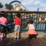 kids in front of mickeys fun wheel