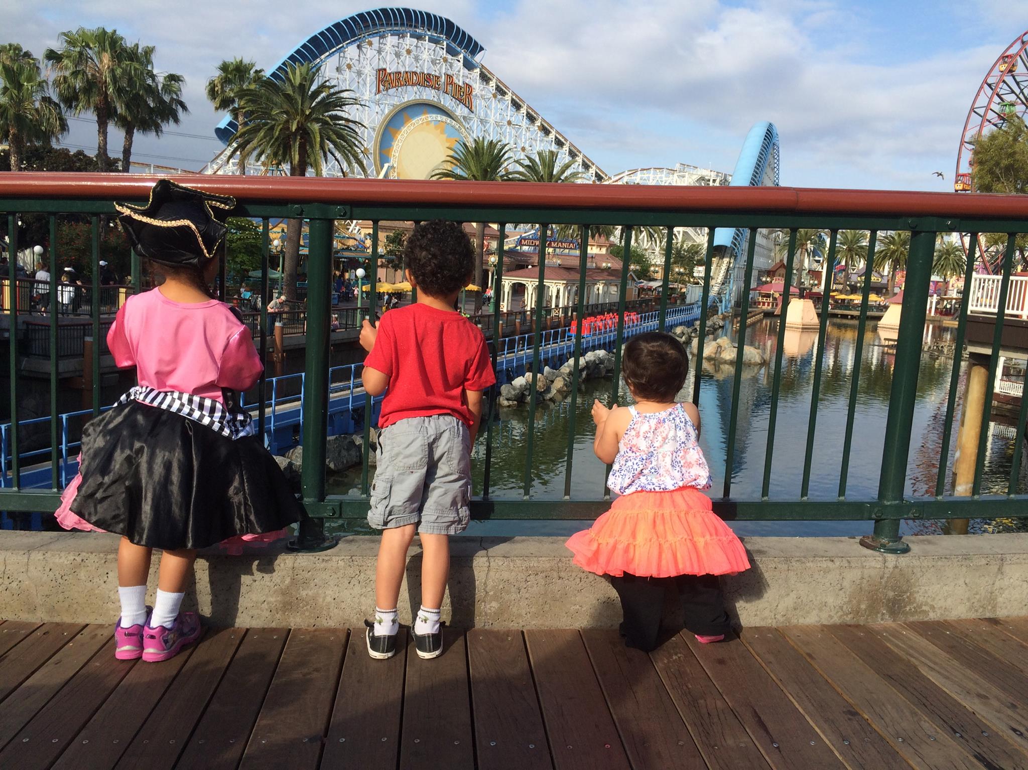 kids in front of mickeys fun wheel